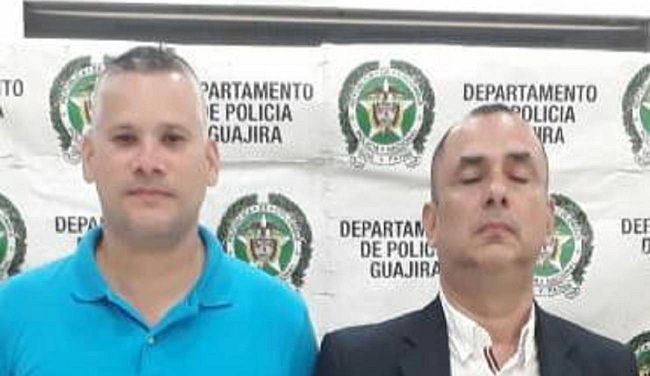 Jaime José Sarmiento Uhia (camisa azul) y Orlando Aguilar Marthey (ojos cerrados).
